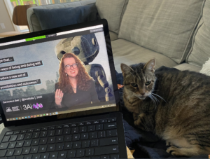 EPIC2021 keynote on a laptop with cat